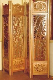 WOODEN SCREEN WITH CARVING WORK DONE ON IT